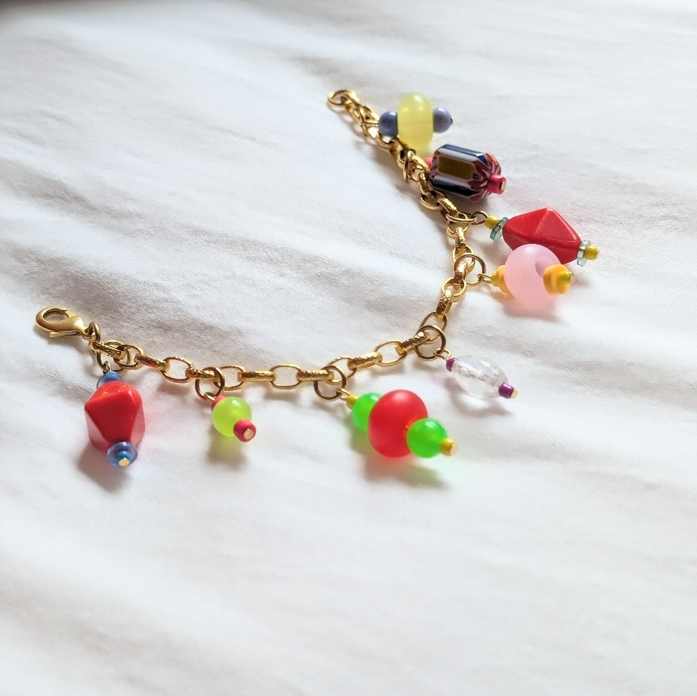 Eclectic Baubles Bracelet mixed charms on gold chain